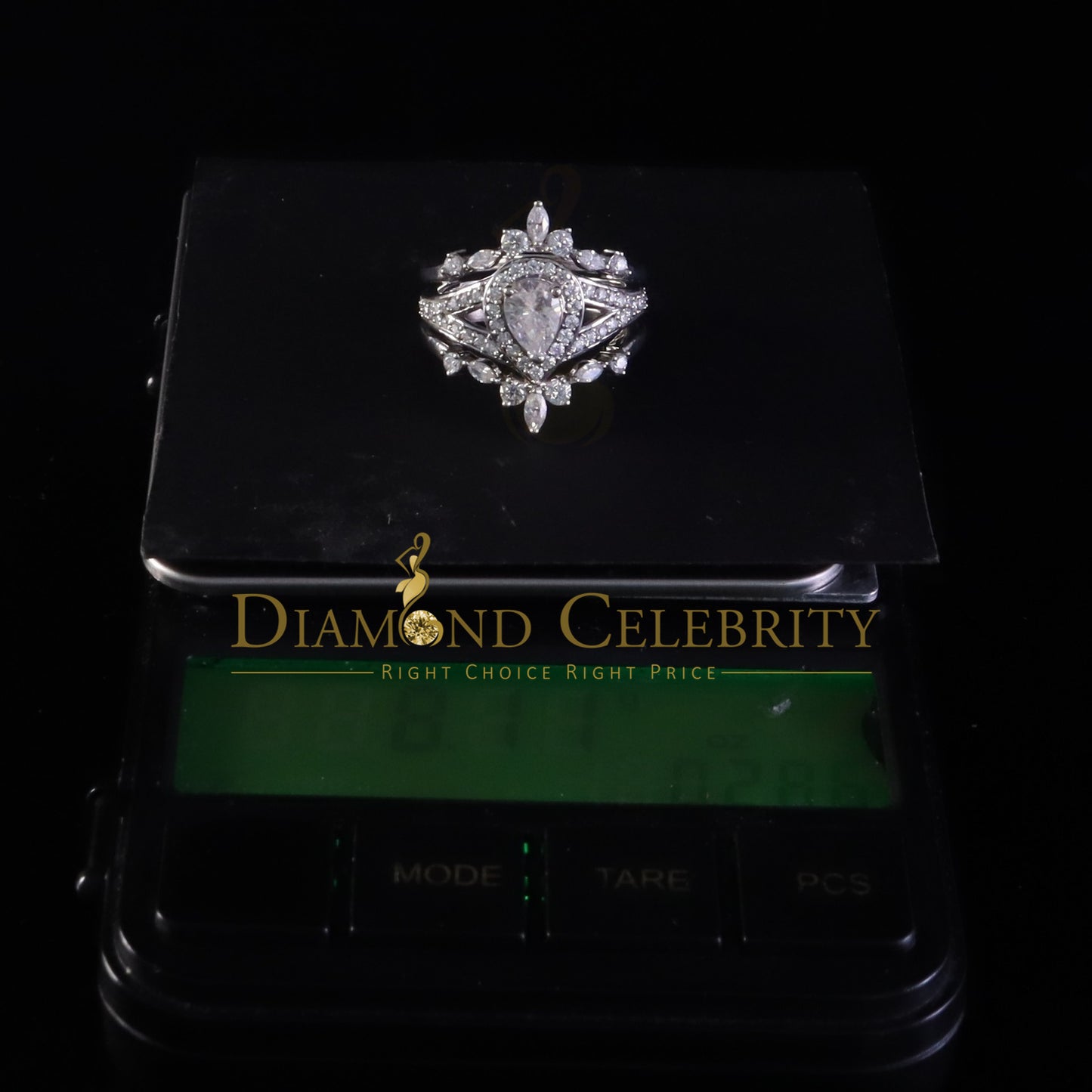 DiamondCelebritees Pear Shape Moissanite Women's 925 Silver White 1.66ct VVS 'D' Ring Guard Size 7