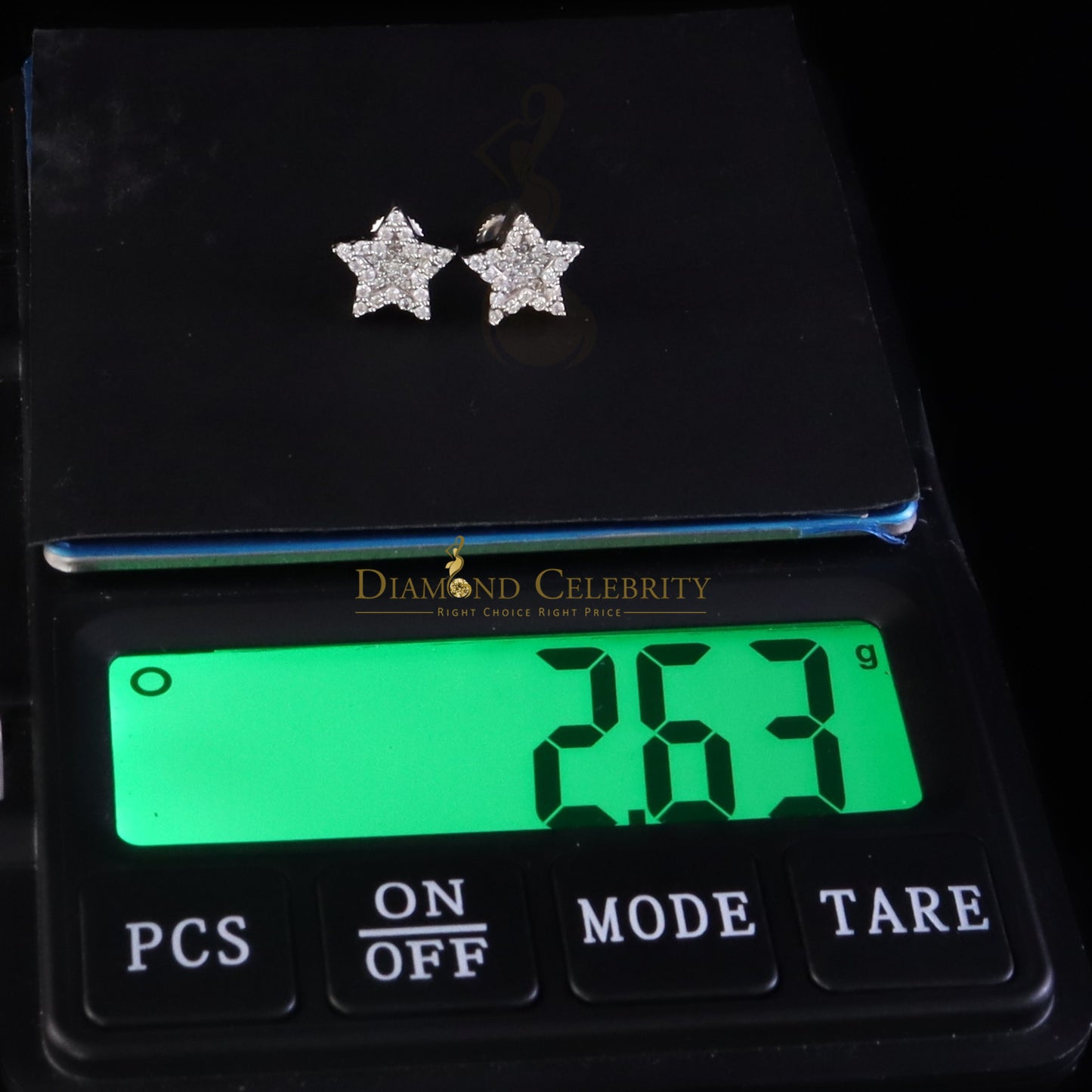 Diamondcelebritees 925 White Silver 0.66ct VVS 'D' Moissanite Star Stud Earring Men's/Womens