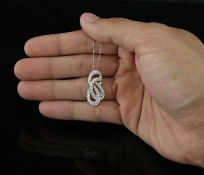 DiamondCelebritees White Sterling Silver Pendant with Charming FASHION Shape 0.28ct Cubic Zirconia